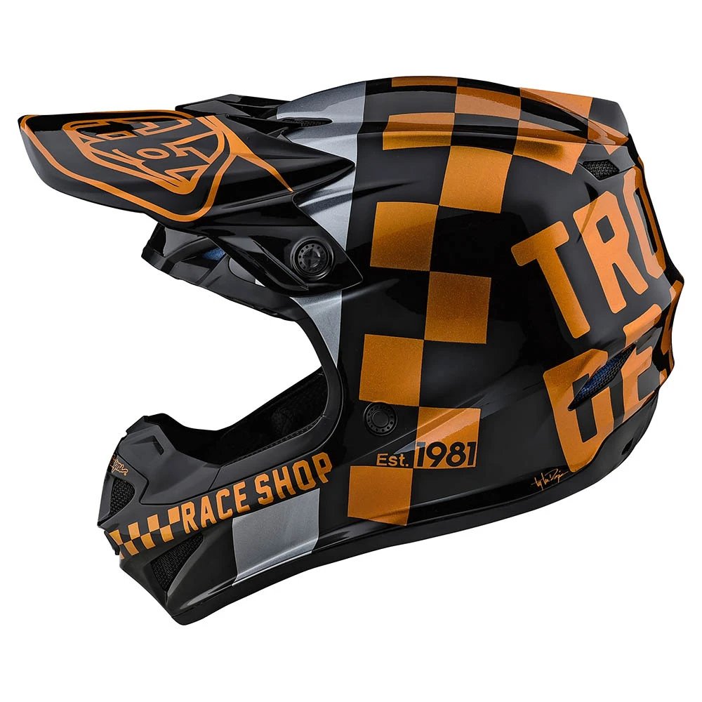 TROY LEE DESIGNS SE4 Checker Motocross Helm schwarz gold
